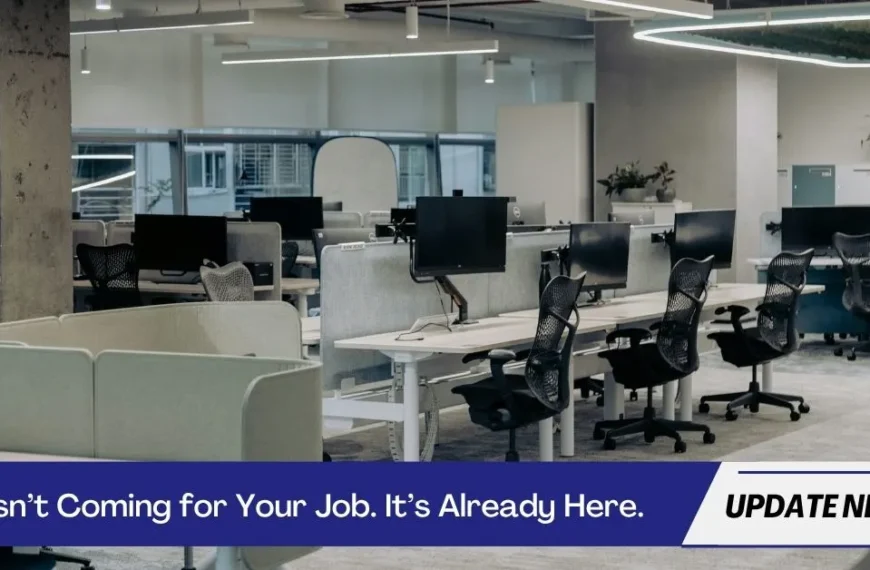 Modern empty office with vacant desks and computers, symbolizing job displacement due to AI.
