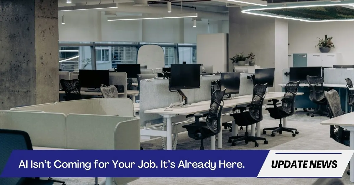 Modern empty office with vacant desks and computers, symbolizing job displacement due to AI.
