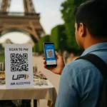 Indian tourist scans UPI QR code at a Paris souvenir shop with the Eiffel Tower in the background