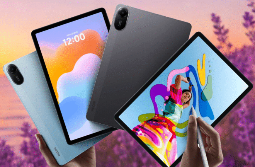 Three Redmi Pad 2 tablets in gray, blue, and silver floating mid-air with vibrant displays showing creative, media, and productivity themes.