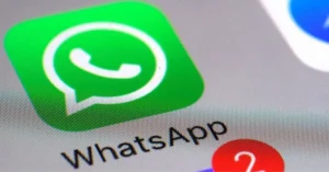 Close-up of the WhatsApp app icon on a smartphone screen